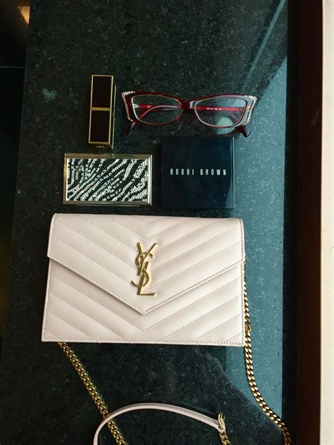 ysl woc gold or silver|ysl wallet on chain price.